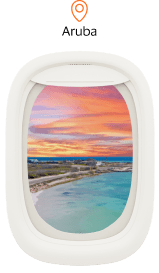 Imagem ilustrativa janela de avião com imagem de Aruba