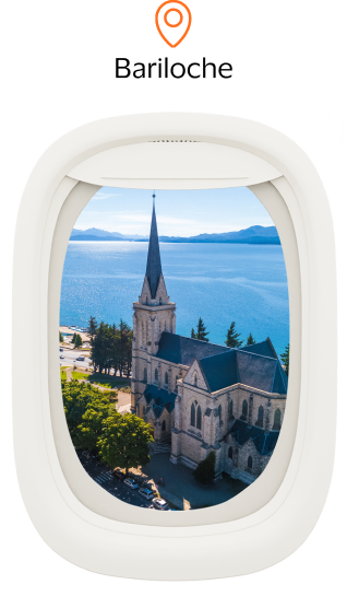 Imagem ilustrativa janela de avião com imagem de Bariloche