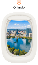 Imagem ilustrativa janela de avião com imagem de Orlando
